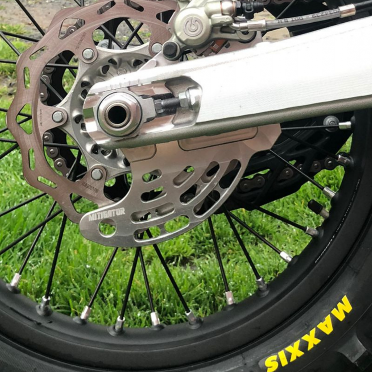 Mitigator Pro Rear Brake Disc Guard - Ktm 2004-2023 Husqvarna 2014-2023 Gasgas 2021-2023 Husaberg 2011-2014 Mitigator Pro Rear Brake Disc Guard - Ktm 2004-2023 Husqvarna 2014-2023 Gasgas 2021-2023 Husaberg 2011-2014